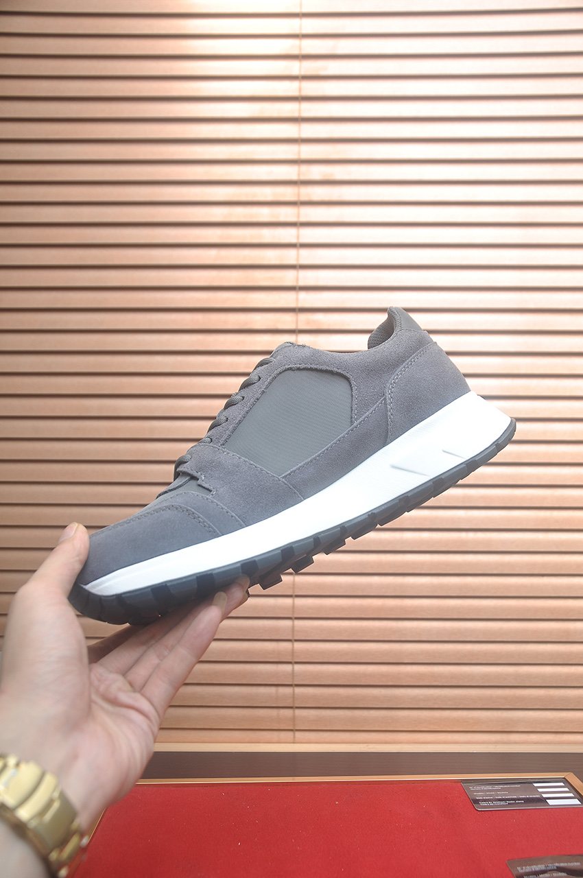 Prada Triangle Plaque Low-Top Sneakers - Lace-Up Closure